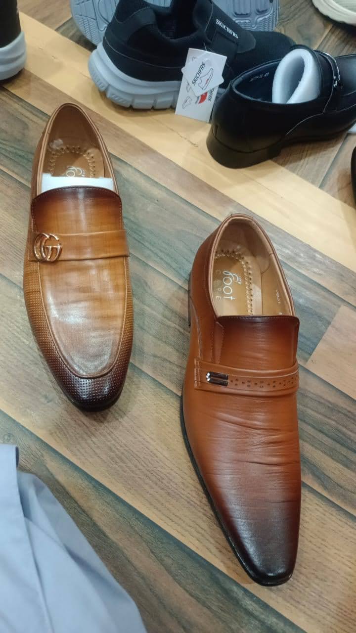 Tan leather loafers pair