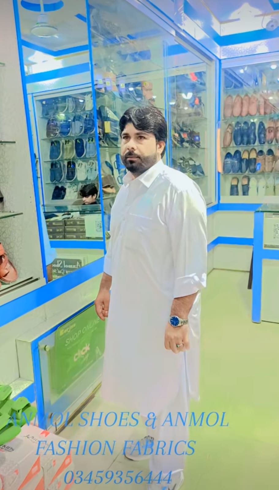 Anmol Shoes owner inside the boutique