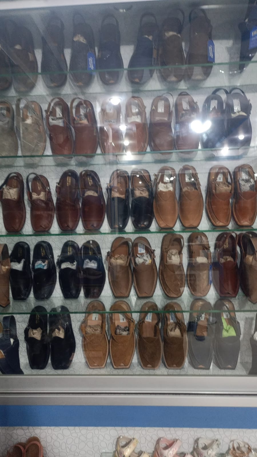 In-store sandal display wall