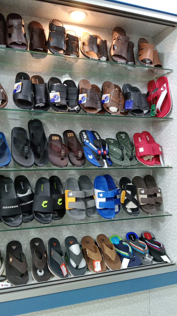 In-store slides and flip-flops wall — Cedarwood, Kito, CAT