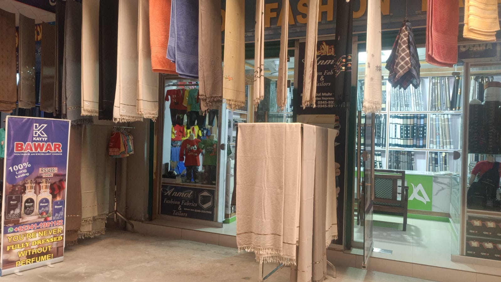 Anmol Fashion storefront with shawls